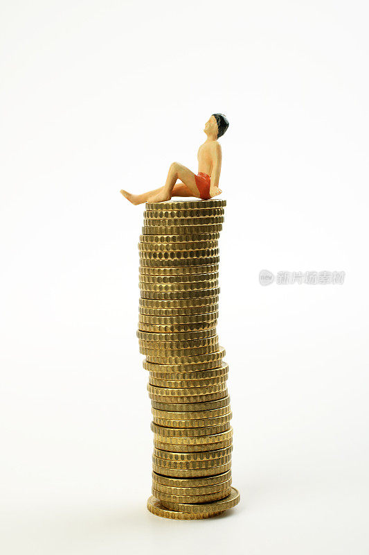 Man resting on coins